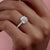 CUSHION CUT MOISSANITE PAVÉ SET SHOULDERS WITH HIDDEN HALO