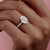 Oval Cut Moissanite Shoulder Set Ring With Hidden Halo