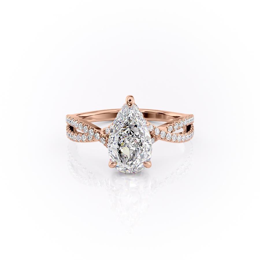 Pear Cut Moissanite Ring With Twisted Stone Set Shoulders